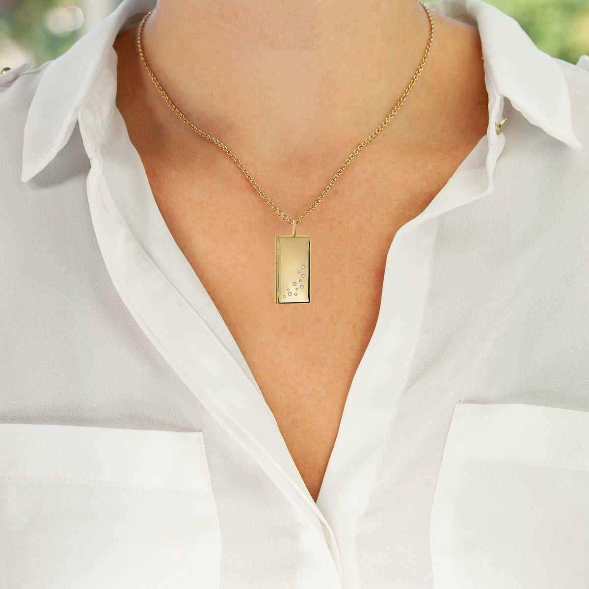 Gold Rectangular Locket with Diamonds and a Personalized Page